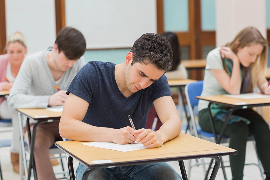 Students taking a test in a classroom in Riverside